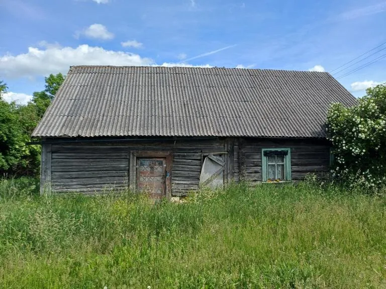 14,58 a žemės sklypas su gyvenamuoju namu Radikių k.