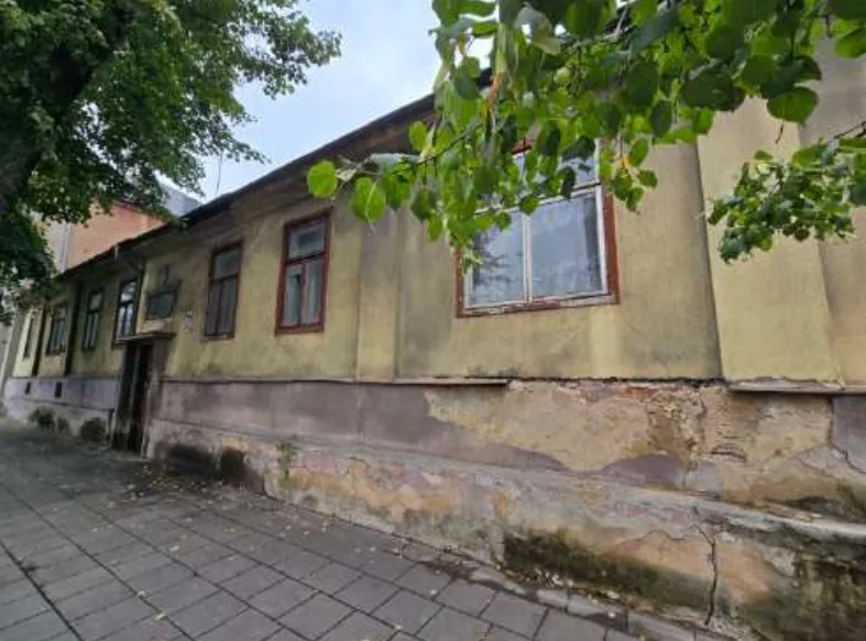 Dalies gyvenamojo namo ir priskirto žemės sklypo pardavimas Kaune